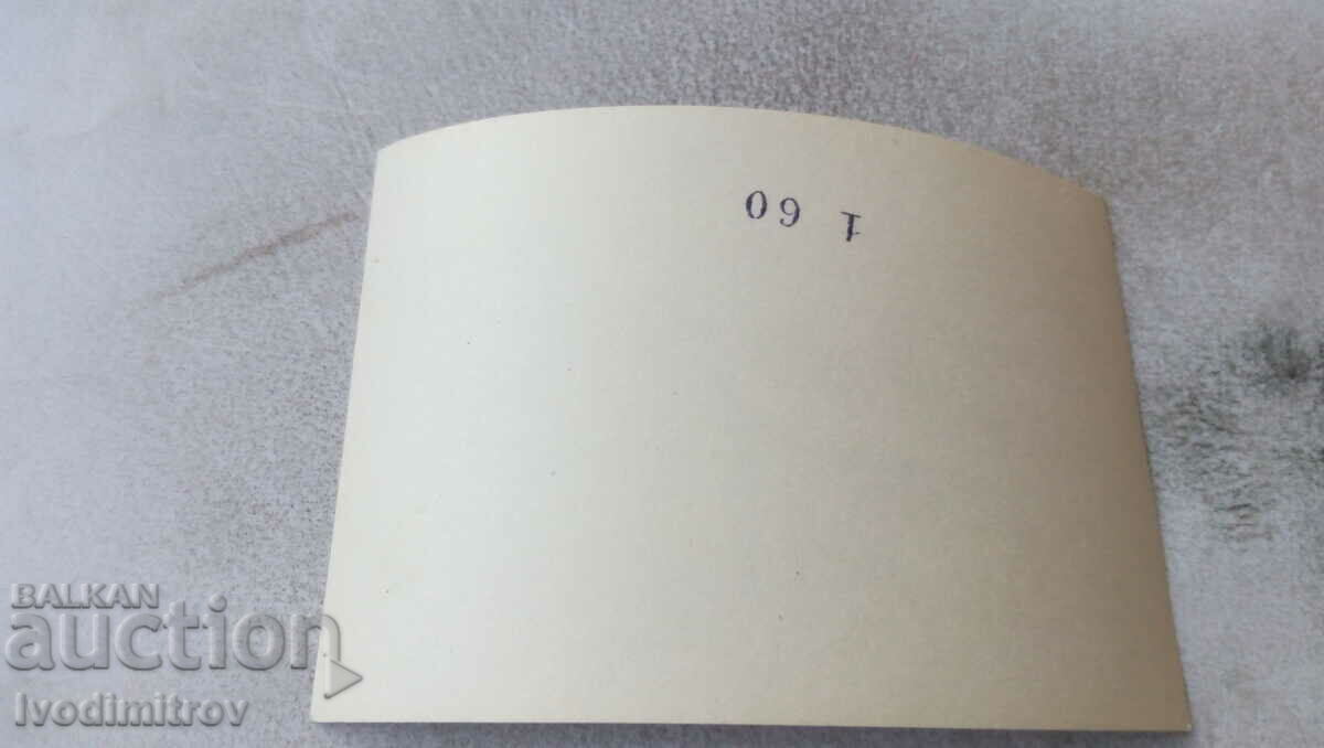 Photo Young men on the seashore next to a wooden boat OTTER with price 2.45 BGN | € 1.25 Photo Young men on the seashore next to a wooden boat OTTER with price 2.45 BGN | € 1.25