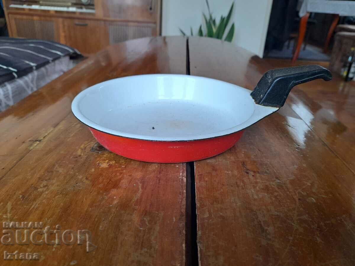 Old enameled omelet pan, pan