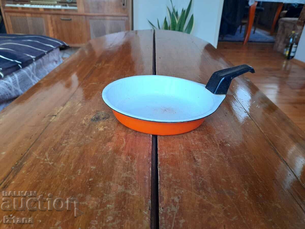 Old enameled omelet pan, pan