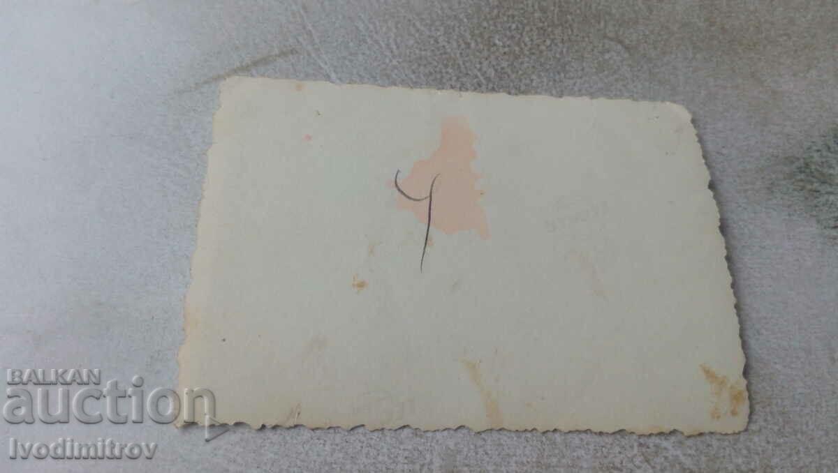 Photo Three men and two young women walking along the street with price 1.45 BGN | € 0.74 Photo Three men and two young women walking along the street with price 1.45 BGN | € 0.74