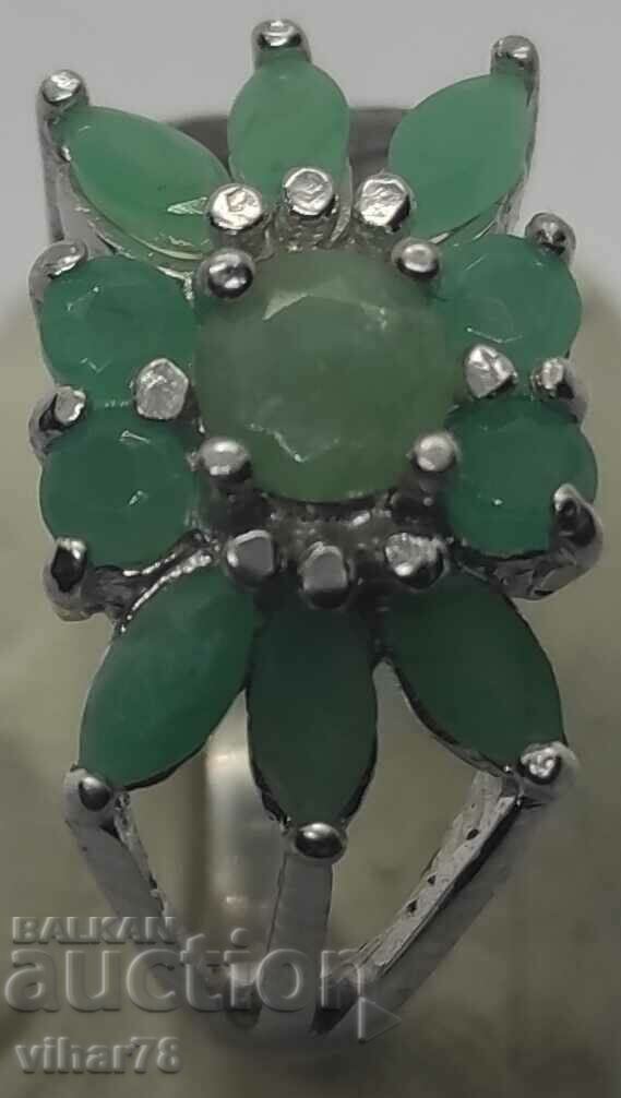 Silver ring with an emerald