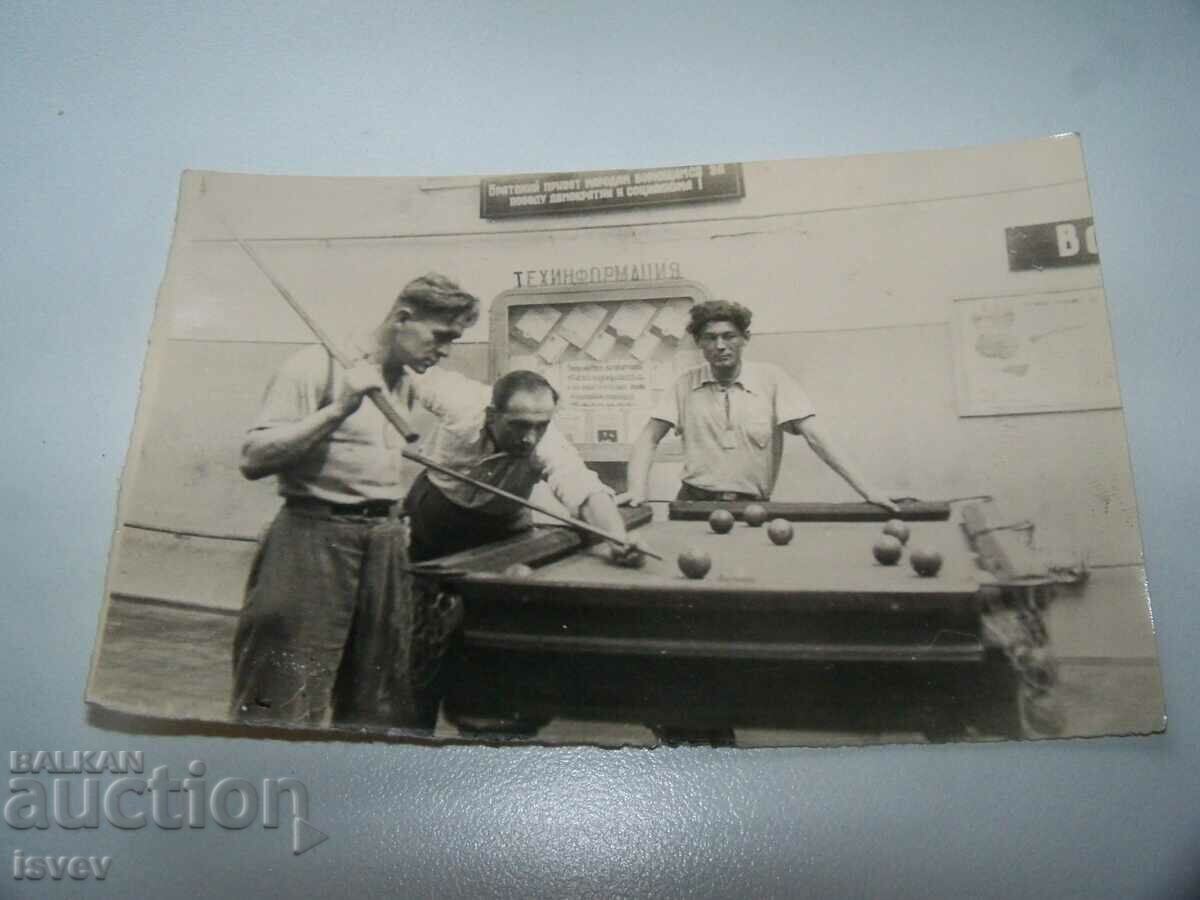 Old social photo from the USSR playing billiards