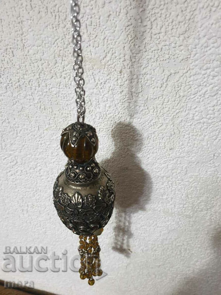 Delivery of A large beautiful pendant with semi-precious stones