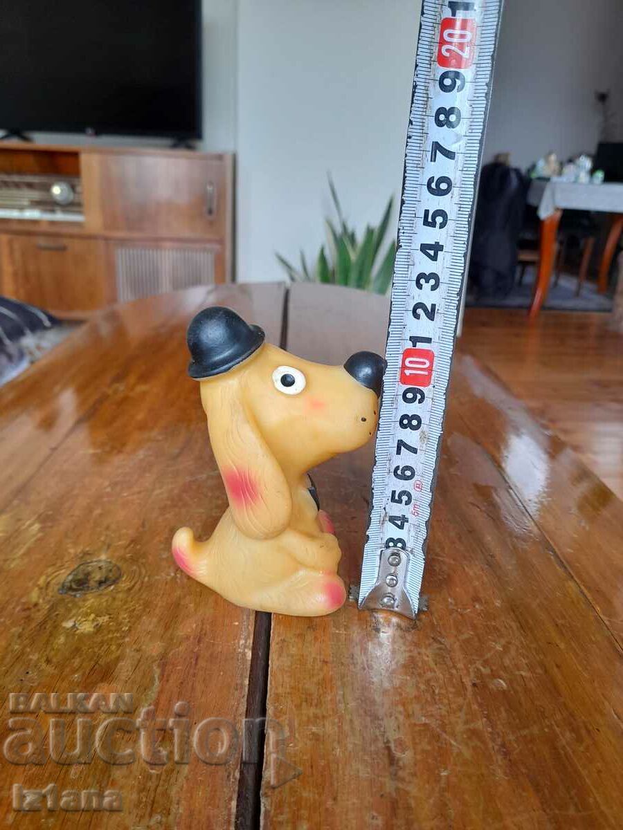 Delivery of Old rubber toy Dog