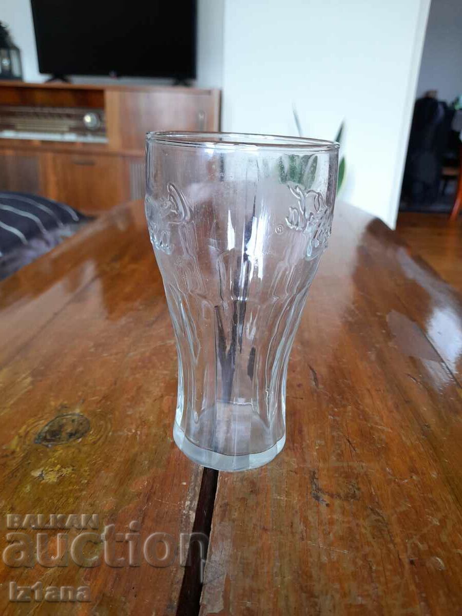 An old glass of Coca Cola, Coca Cola with price 28.00 BGN | € 14.32 An old glass of Coca Cola, Coca Cola with price 28.00 BGN | € 14.32