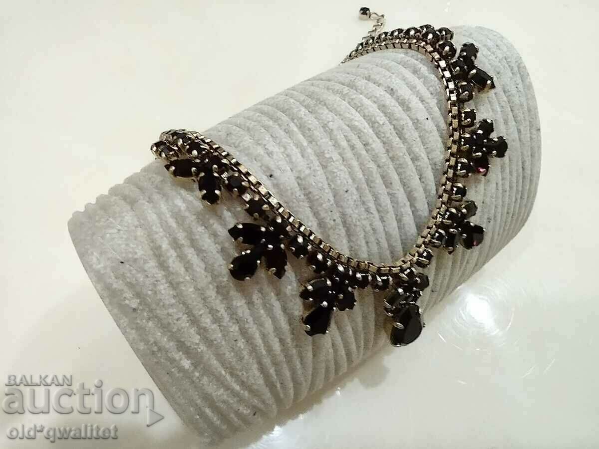 Delivery of Old elegant necklace with dark red accents and Delivery of Old elegant necklace with dark red accents and