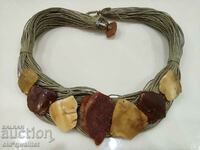 Old elegant necklace with Amber and bronze elements