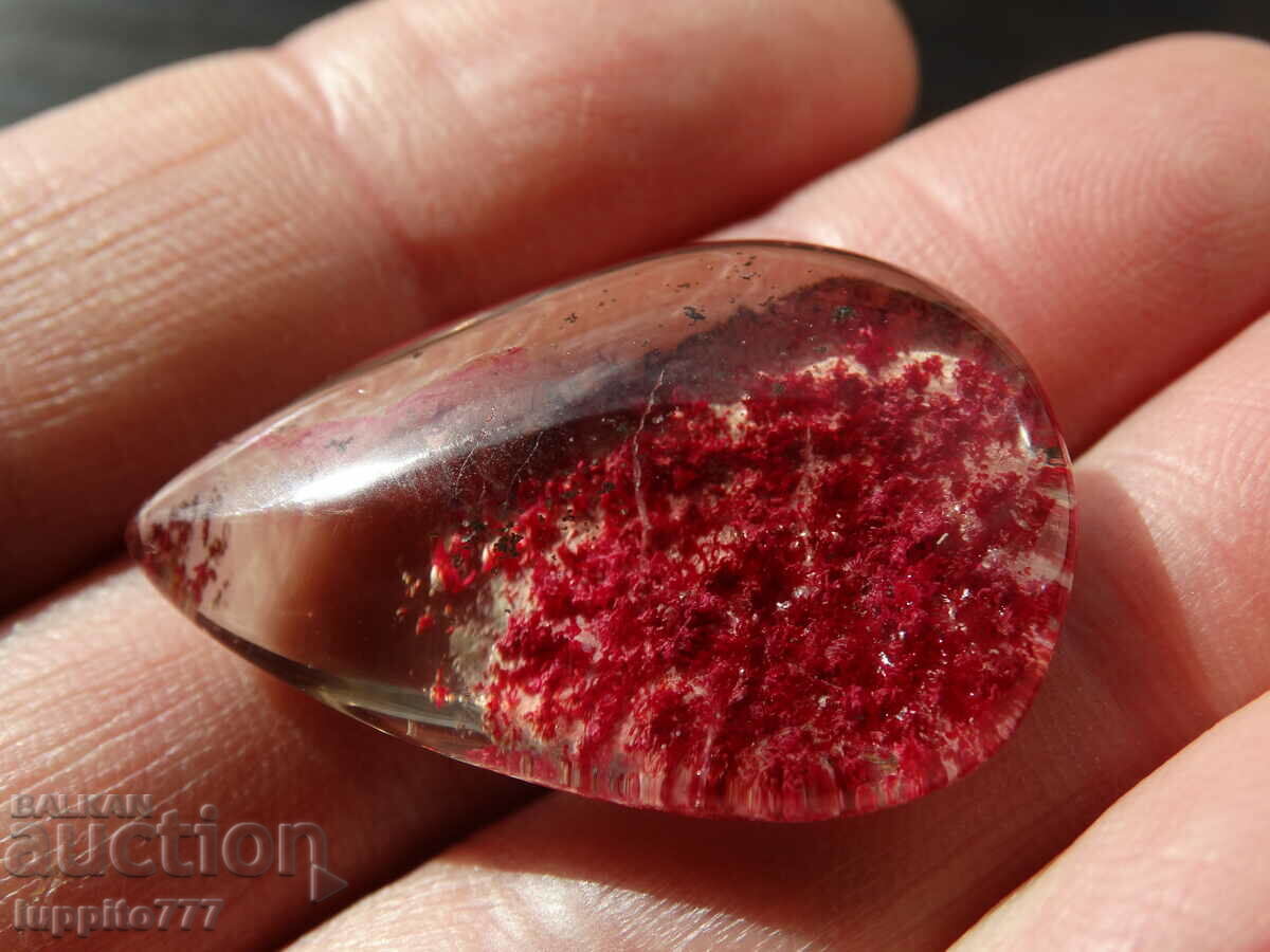 Auction  74 carat rutile phantom quartz