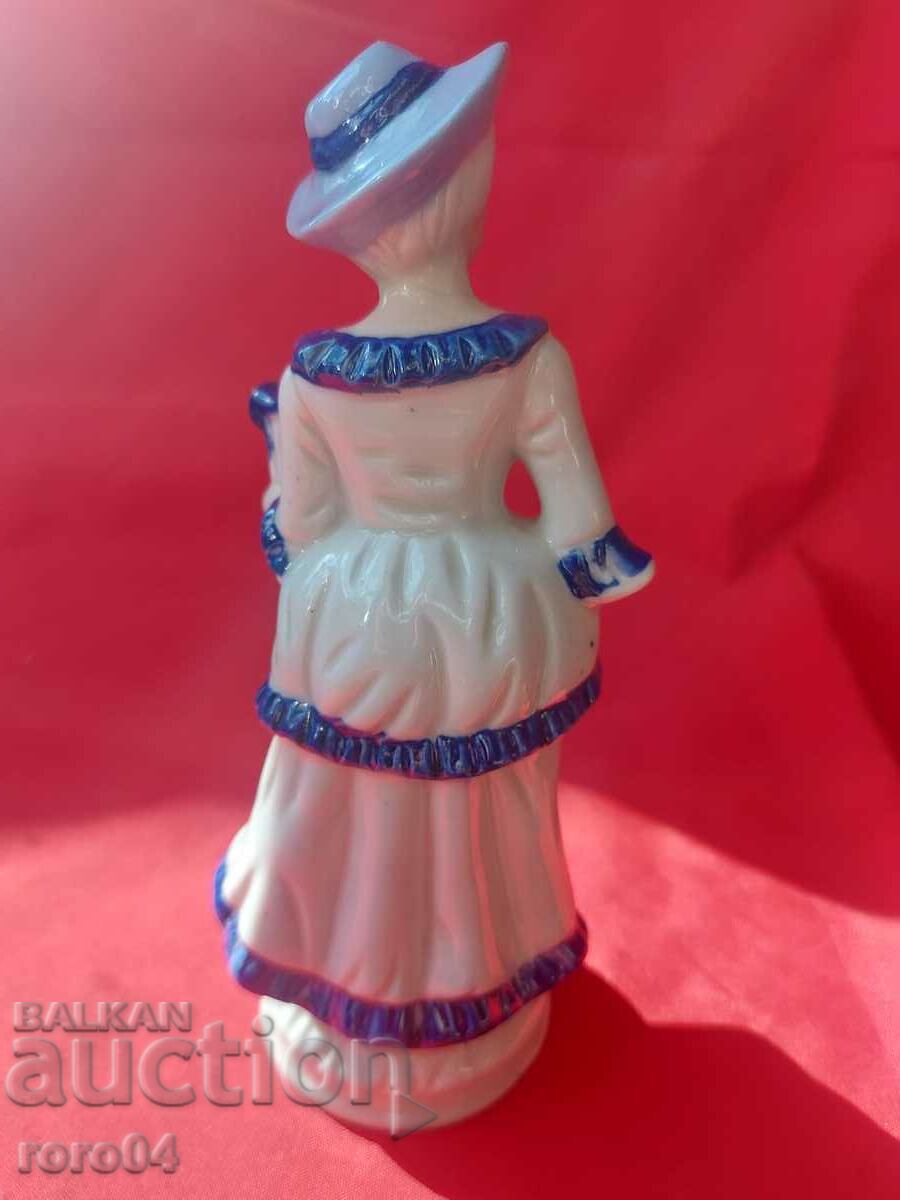 Delivery of BEAUTIFUL OLD PORCELAIN STATUS