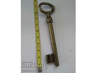 A large old bronze key