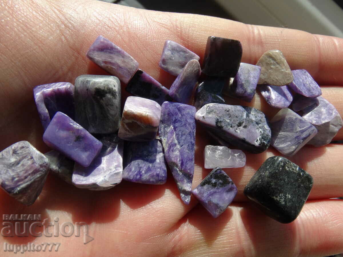 Auction  36.40 grams of charoite 27 pieces cabochon