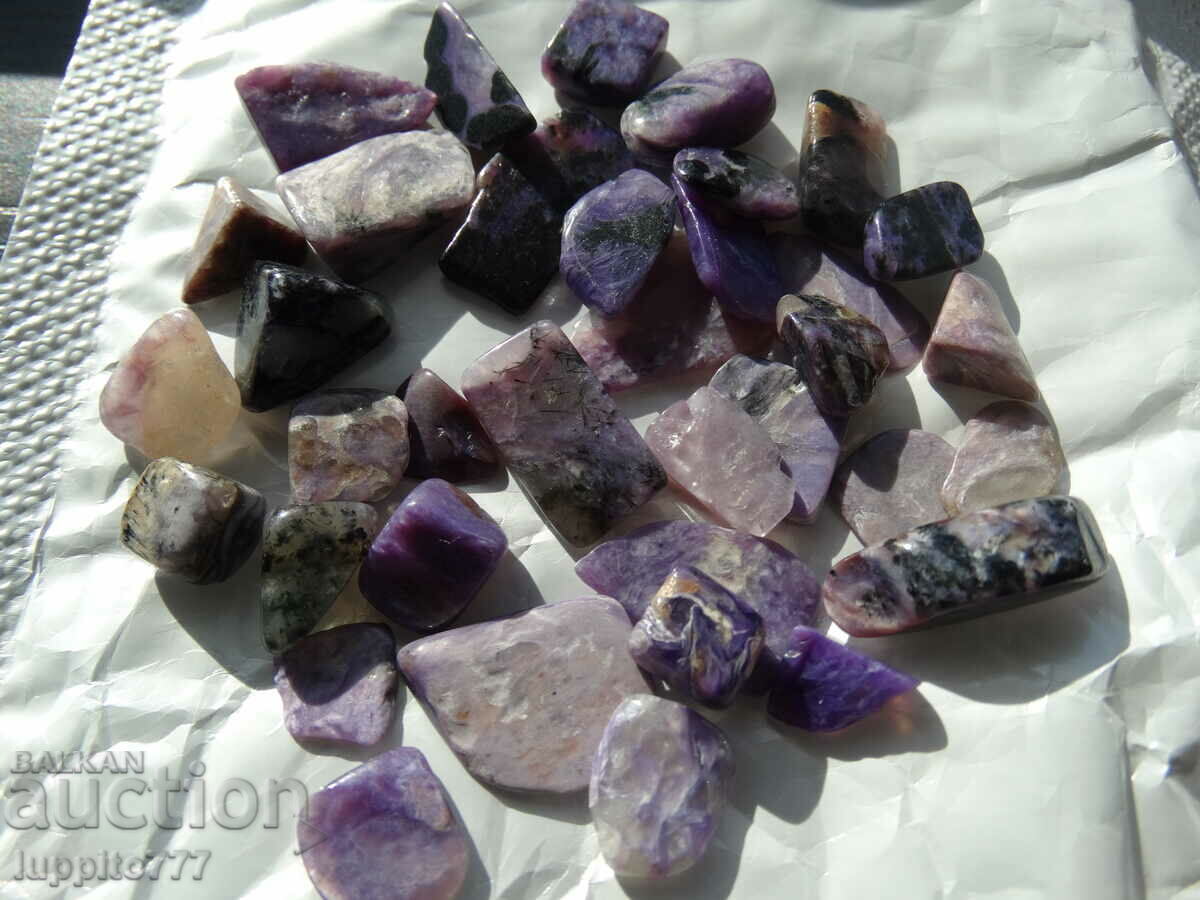 Delivery of 27.90 grams of charoite 31 cabochons Delivery of 27.90 grams of charoite 31 cabochons