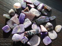 27.90 grams of charoite 31 cabochons