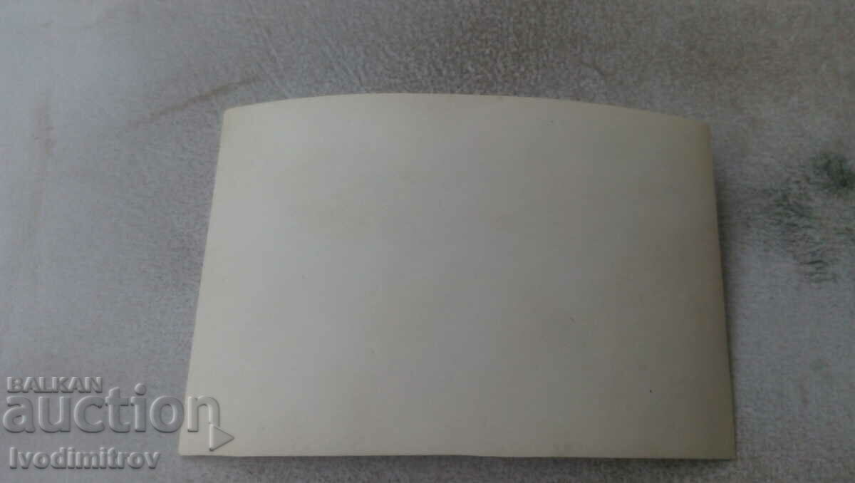 Photo Four children sitting on the grass with price 0.75 BGN | € 0.38