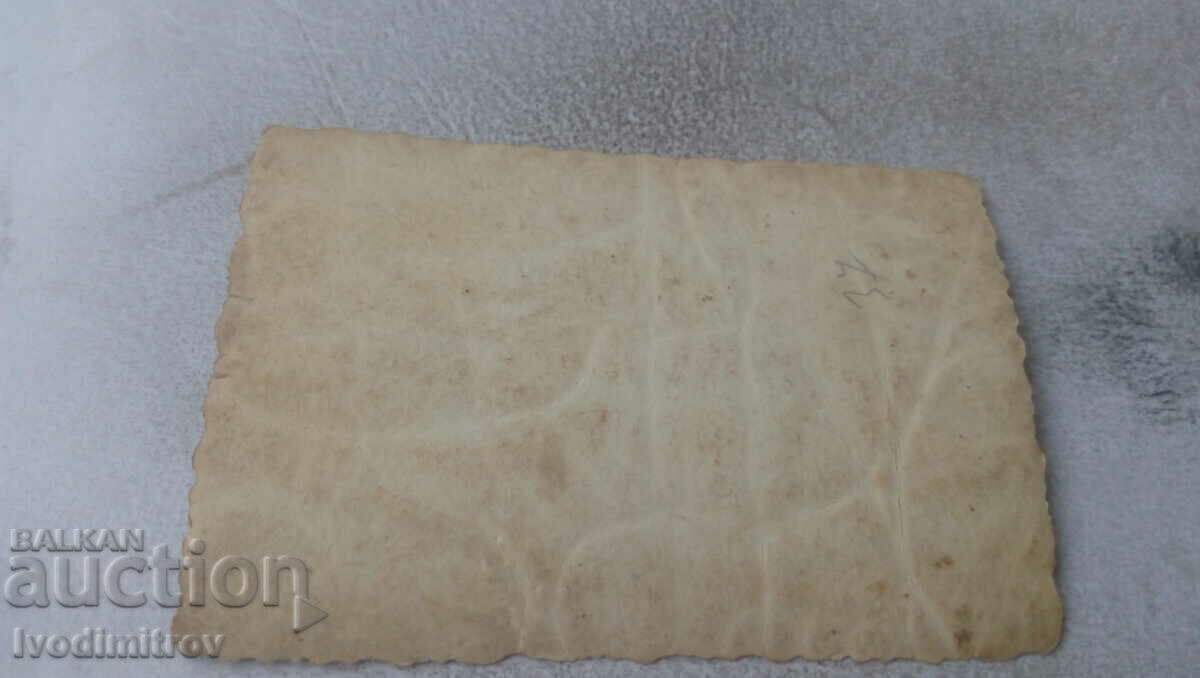 Photo Man and young women in front of a factory with price 0.85 BGN | € 0.43 Photo Man and young women in front of a factory with price 0.85 BGN | € 0.43