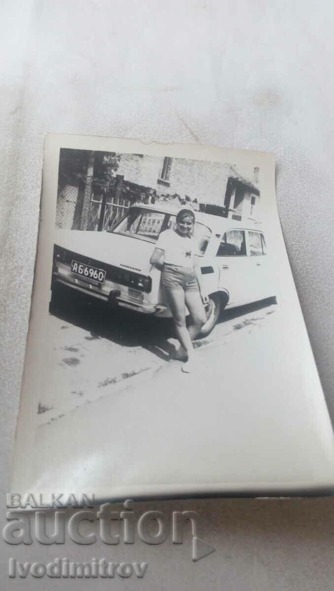 Photo Sofia Young girl next to a car Moskvich