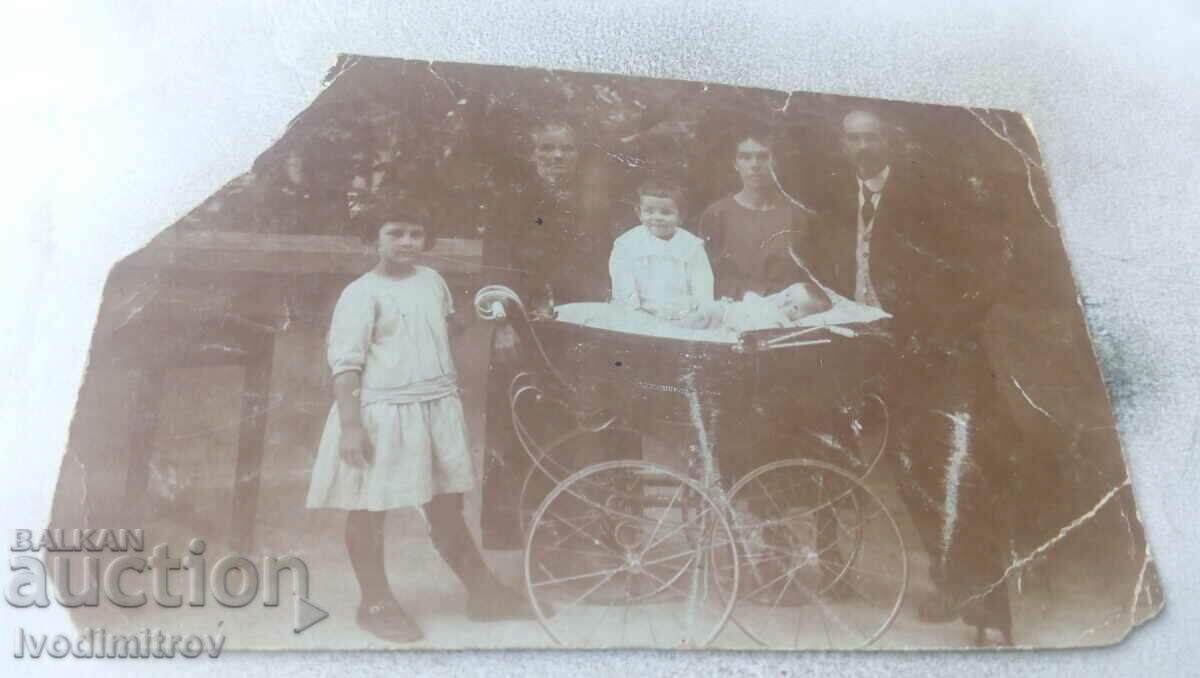 Ms. Dupnitsa Man two women children and a baby in a retro pram