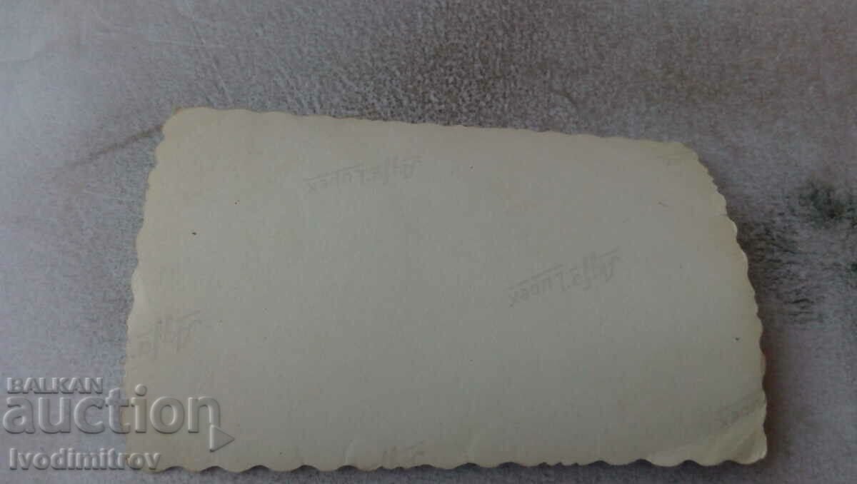 Photo Two men and a boy in front of a newly built house with price 0.85 BGN | € 0.43 Photo Two men and a boy in front of a newly built house with price 0.85 BGN | € 0.43