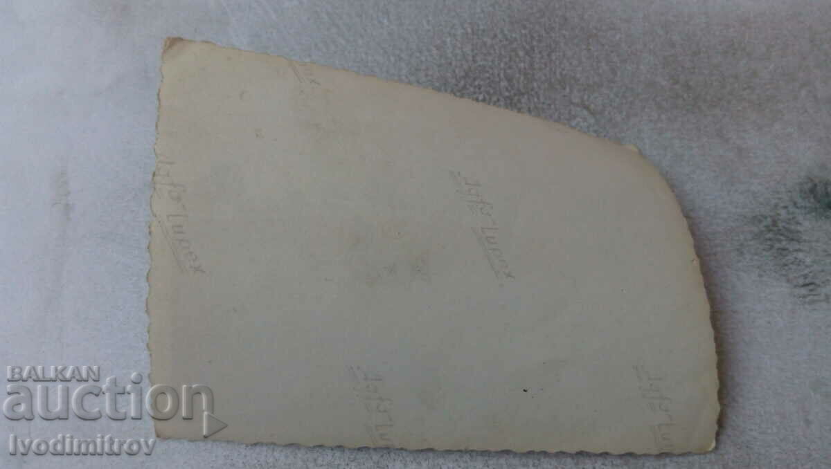 Photo A man and two women on a truck chassis with price 0.85 BGN | € 0.43 Photo A man and two women on a truck chassis with price 0.85 BGN | € 0.43