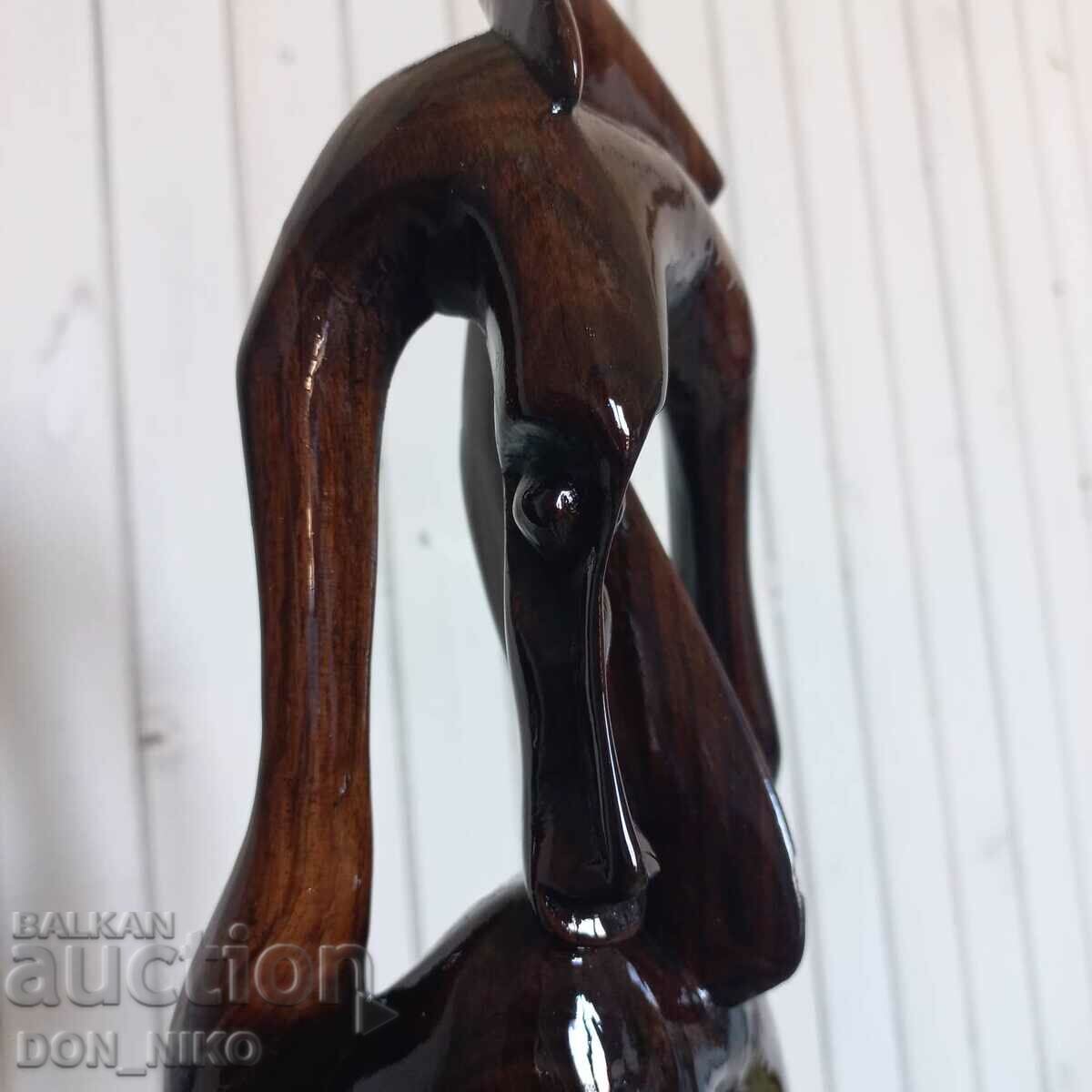 Auction Mahogany Figurine on Wooden Base Auction Mahogany Figurine on Wooden Base