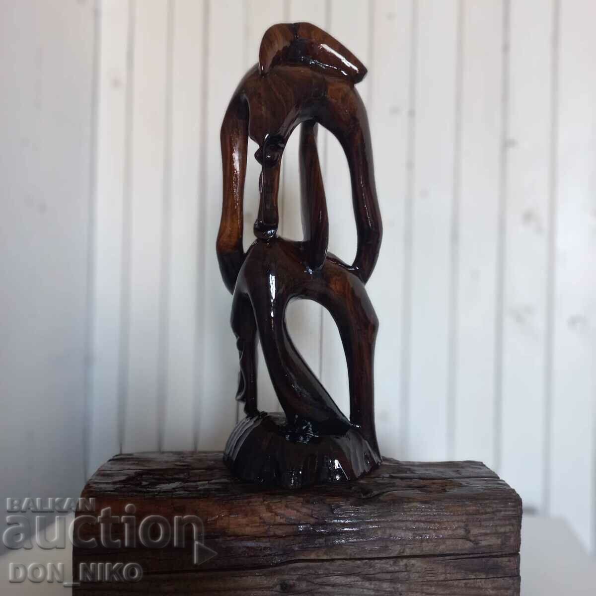 Delivery of Mahogany Figurine on Wooden Base Delivery of Mahogany Figurine on Wooden Base