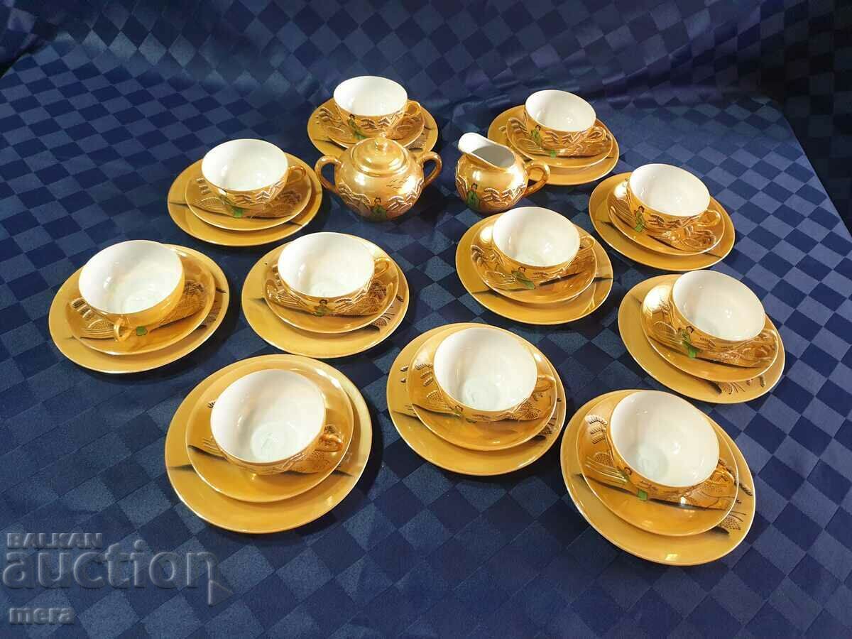 Auction Fine Japanese coffee service with Geisha on the bottom - 35 pieces Auction Fine Japanese coffee service with Geisha on the bottom - 35 pieces