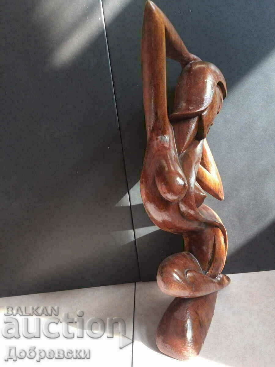 Delivery of Erotica, woman, figure, sculpture, wooden panel. Delivery of Erotica, woman, figure, sculpture, wooden panel.