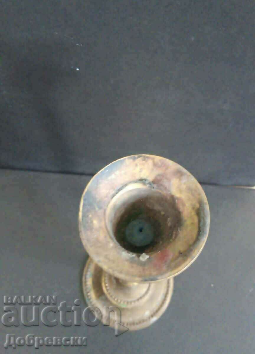 Old bronze candlestick with price 35.00 BGN | € 17.90 Old bronze candlestick with price 35.00 BGN | € 17.90