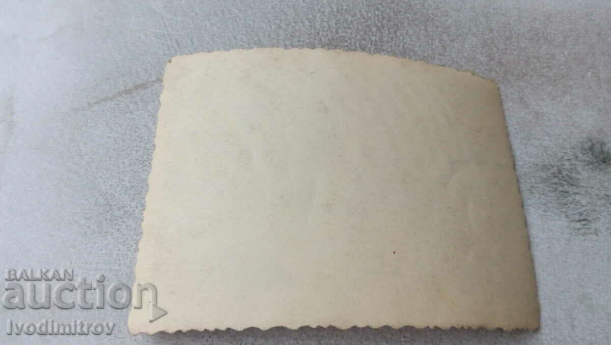 Photo Men and women at a table with price 0.75 BGN | € 0.38 Photo Men and women at a table with price 0.75 BGN | € 0.38