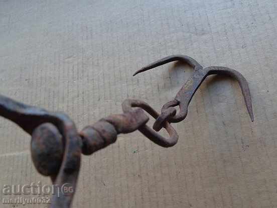 Auction  An old forged scraping hook, double twin