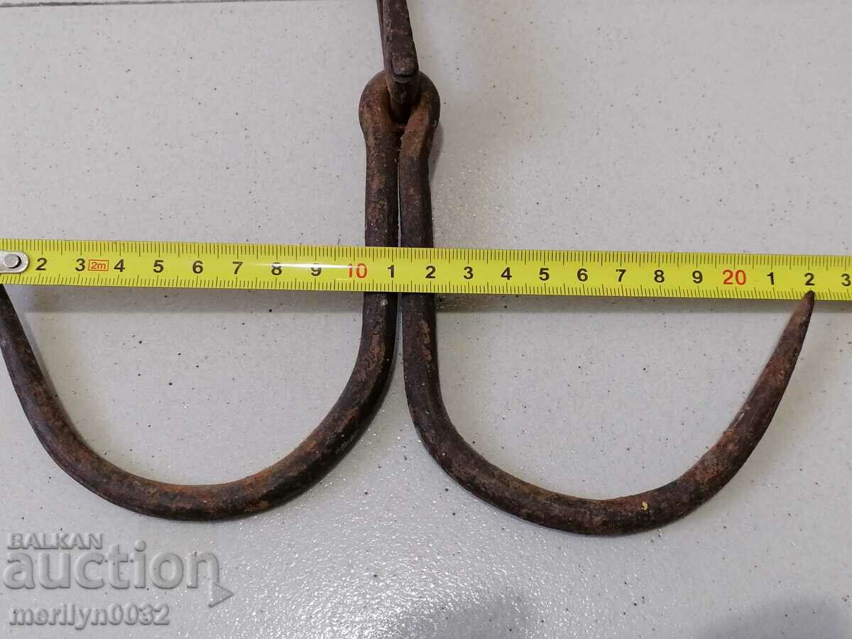 Delivery of An old forged scraping hook, double twin Delivery of An old forged scraping hook, double twin