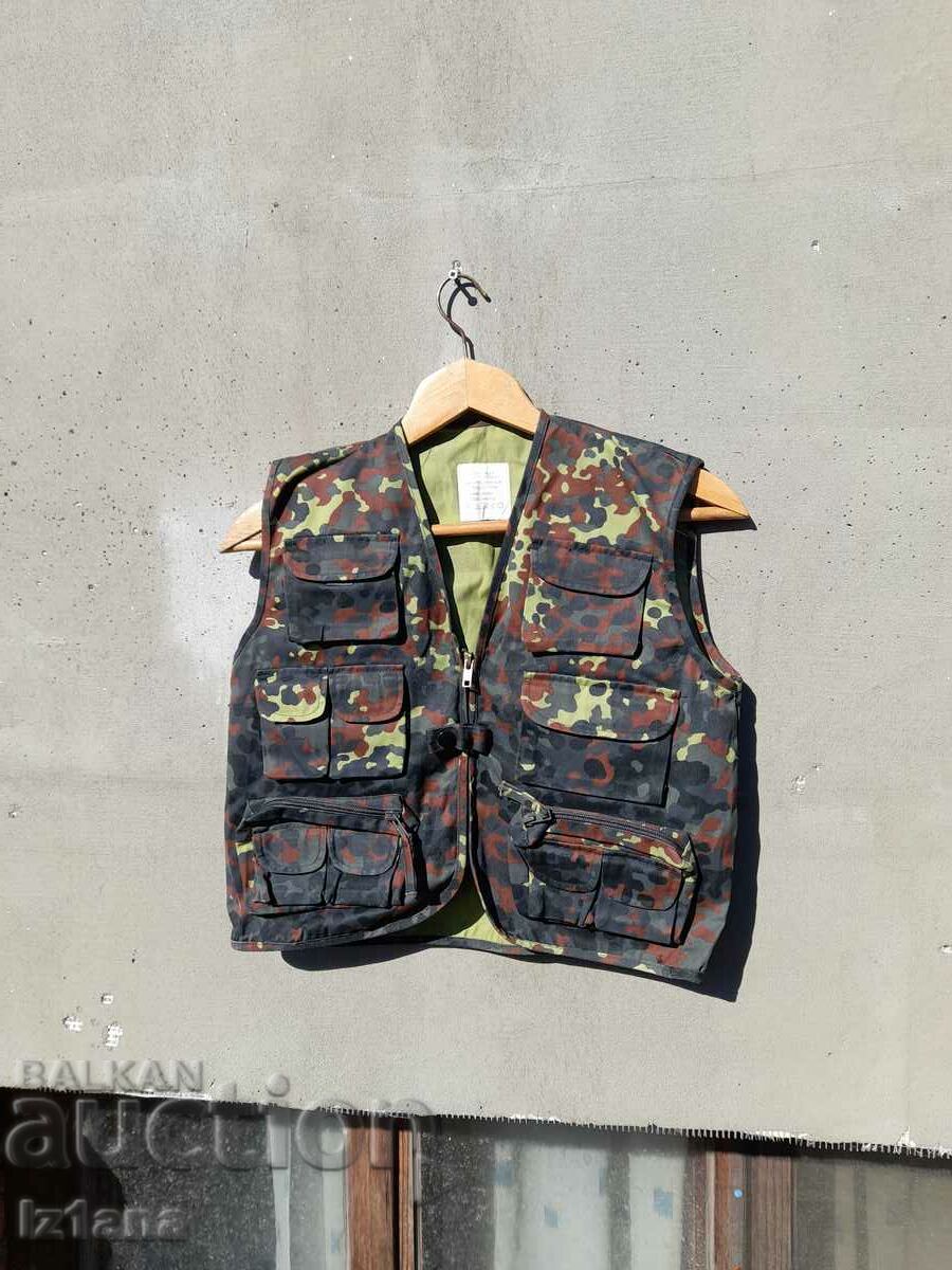 Old children's camouflage vest