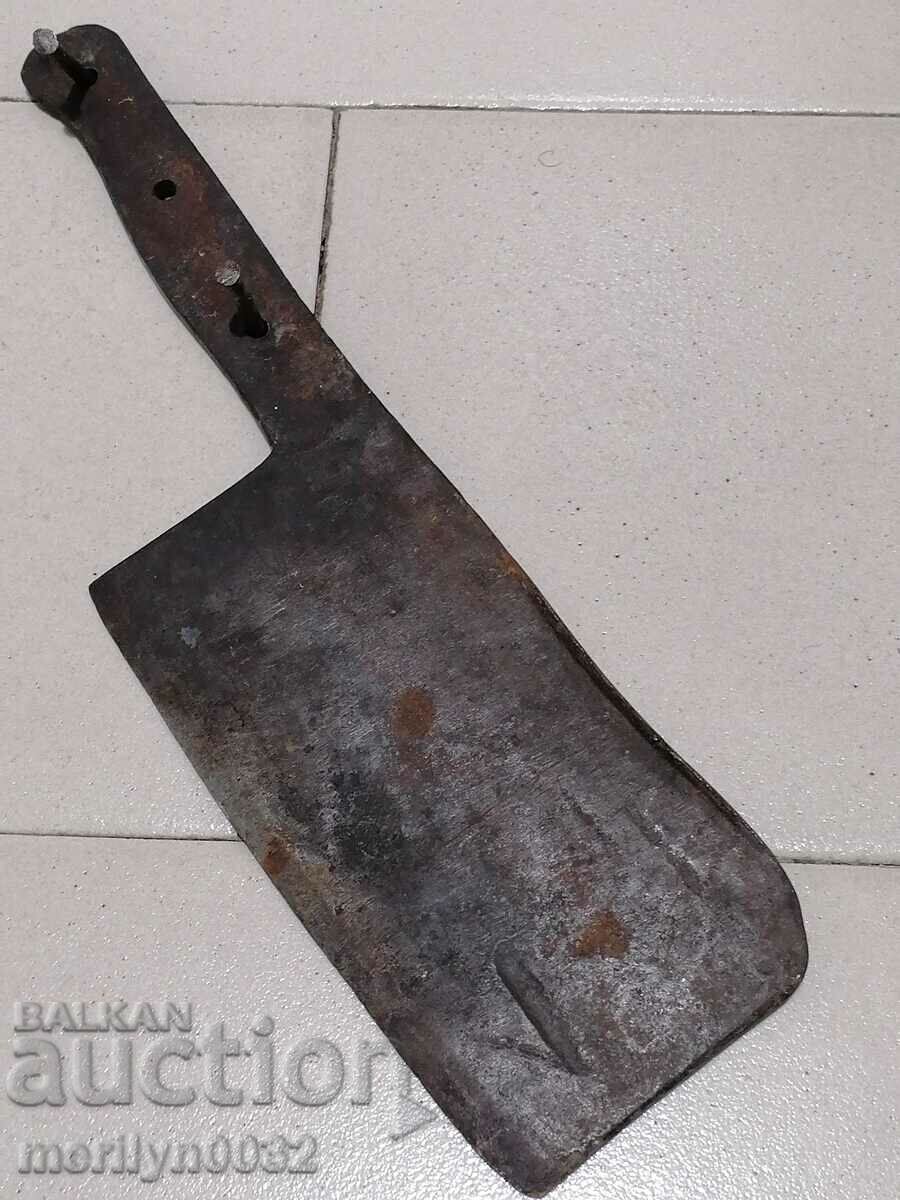 Old forged scythe, ax, hoop, knife, machete, blade