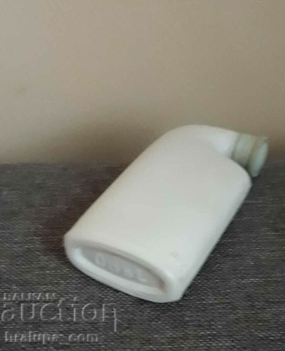 Delivery of Old porcelain Odol mouthwash bottle