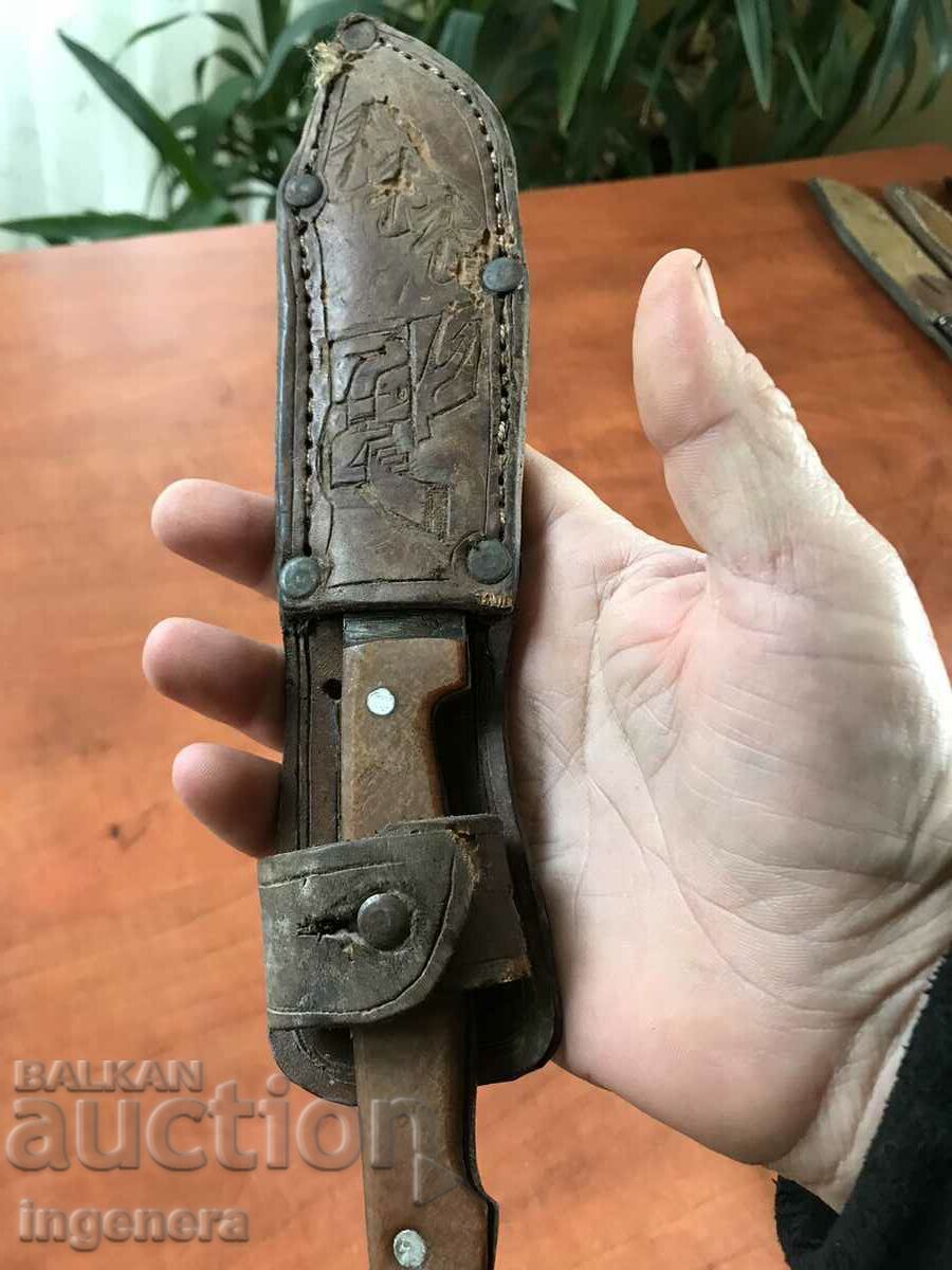 Auction KNIFE BLADE WITH LEATHER HANDLE Auction KNIFE BLADE WITH LEATHER HANDLE