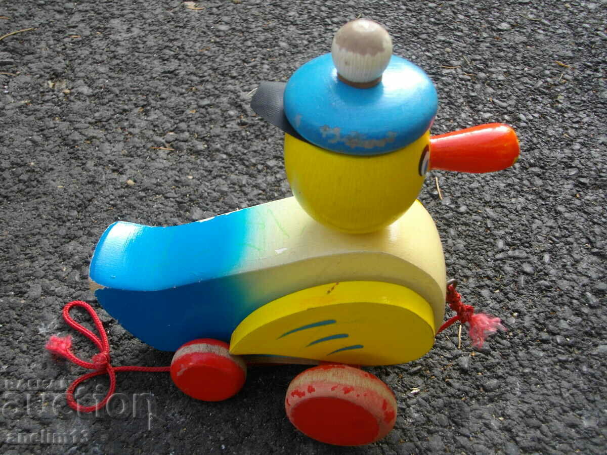 Auction  OLD WOODEN DUCK TOY