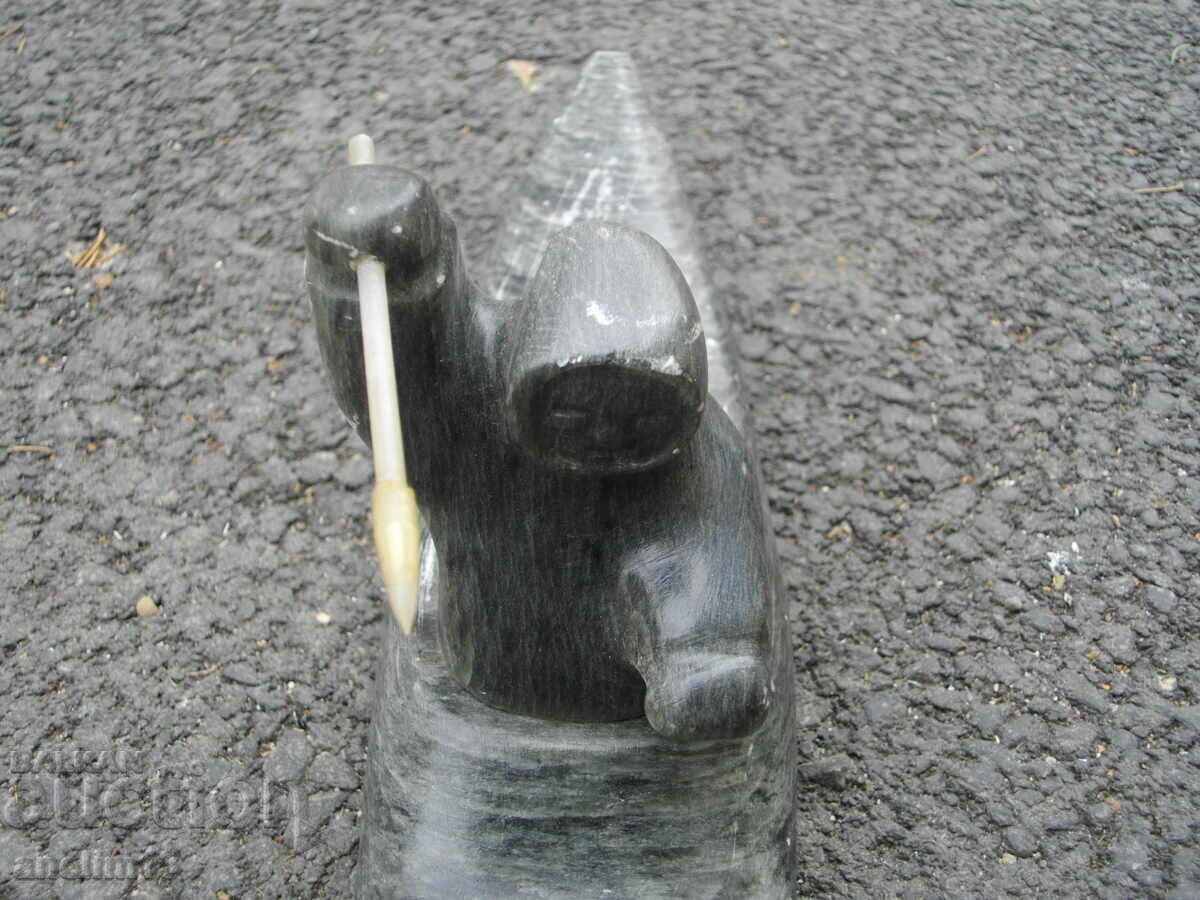 Auction  OLD FIGURE STATUETTE ESKIMO HUNTER SPEAR CANOE
