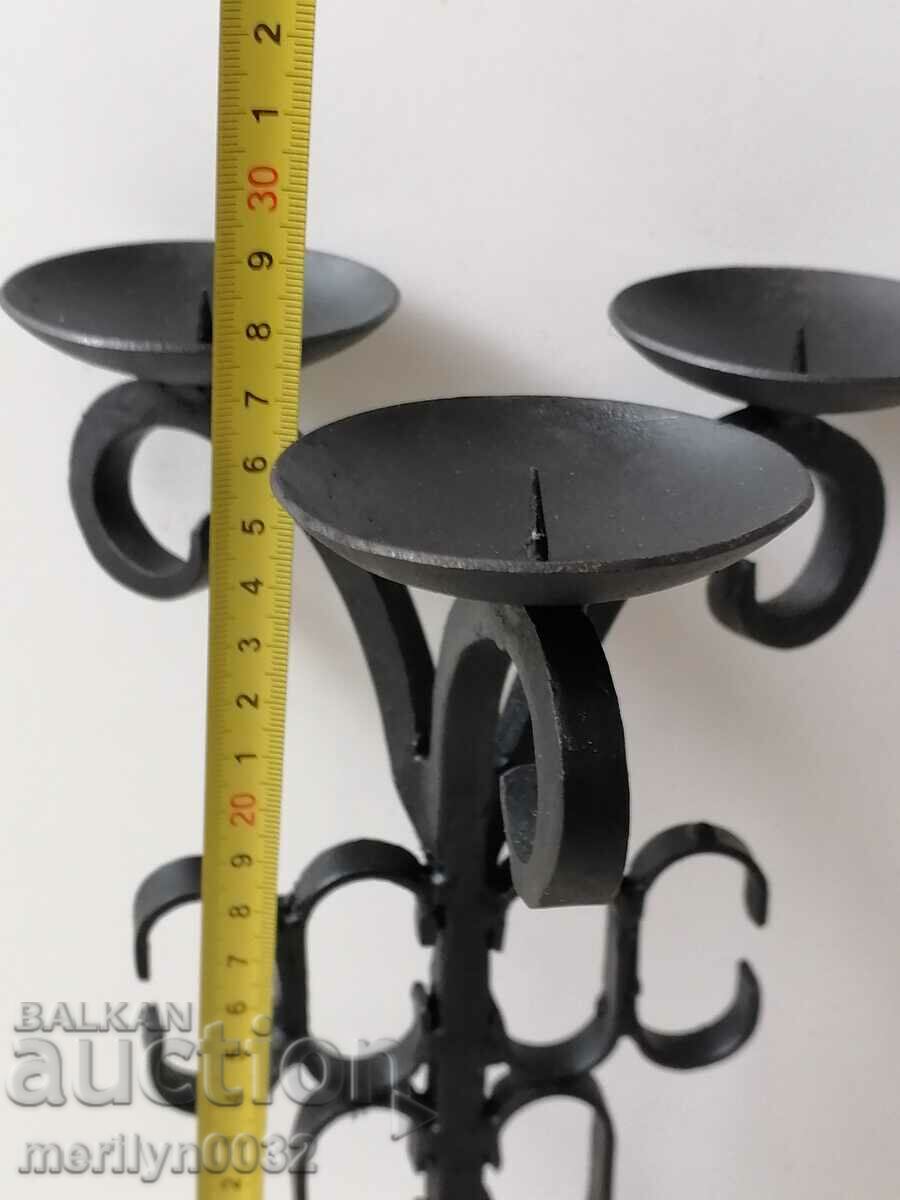Delivery of An old candle made of wrought iron lamp Delivery of An old candle made of wrought iron lamp