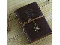 Old Vintage pirate diary with anchor and rudder