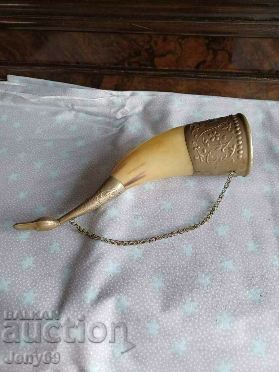 Souvenir horn with bronze applications