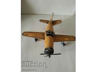 Old tin toy airplane