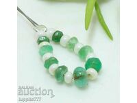 5.50 carat emerald emerald string