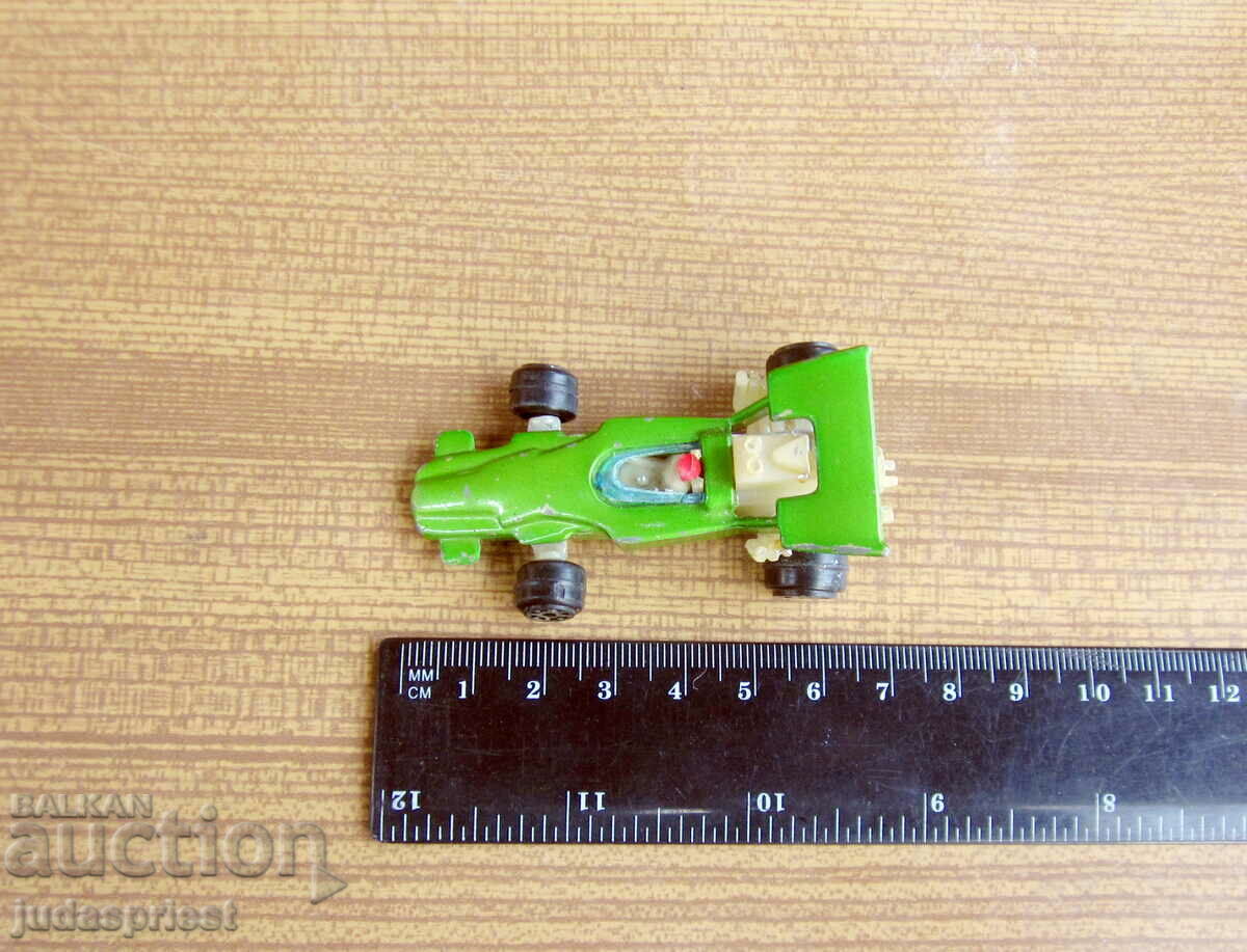 Delivery of old metal toy car formula 1 lotus climax F1 Delivery of old metal toy car formula 1 lotus climax F1