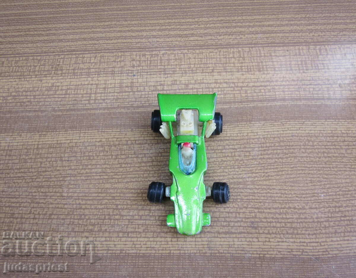 Veche mașină de jucărie din metal formula 1 lotus climax F1