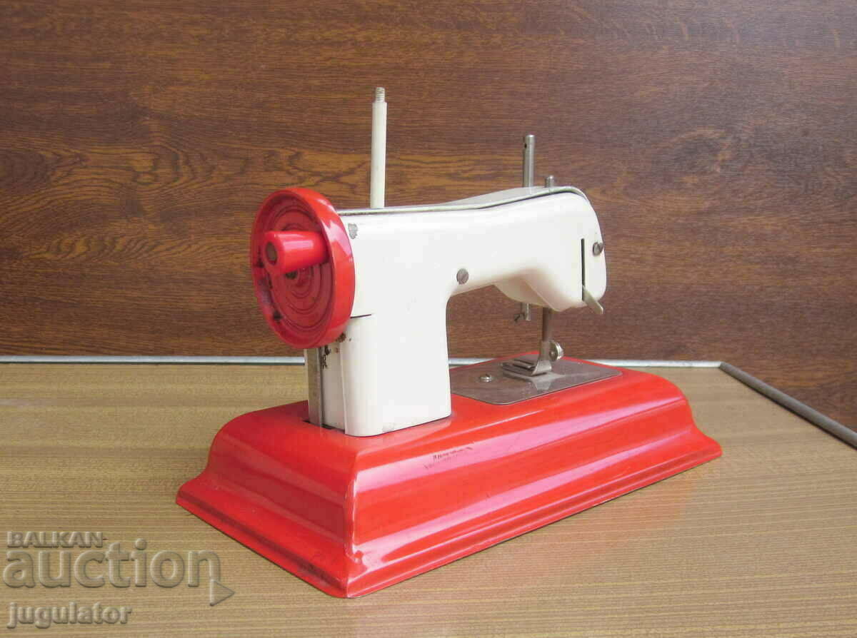 Παράδοση παλιά μηχανική ραπτομηχανή παιχνιδιών λαμαρίνας Παράδοση παλιά μηχανική ραπτομηχανή παιχνιδιών λαμαρίνας