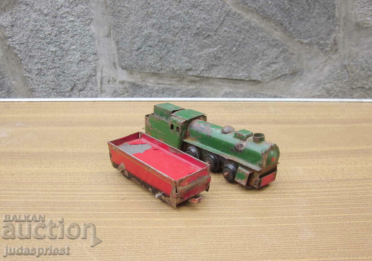 Auction old metal train metal locomotive with carriage from the soca Auction old metal train metal locomotive with carriage from the soca