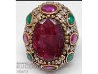 Huge solid silver ring with rubies and emeralds