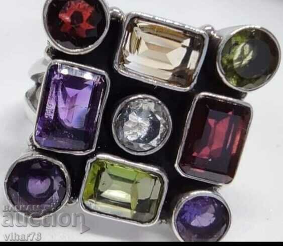 Auction Old silver ring with sapphire, citrine, garnet and amethyst Auction Old silver ring with sapphire, citrine, garnet and amethyst