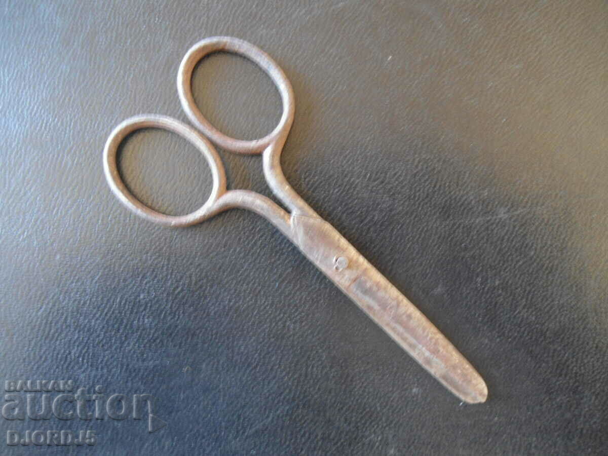 Old small scissors, marking