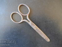 Old small scissors, marking